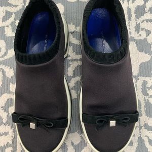 Stuart Weitzman black and white sneaker women’s size 5.5; read description